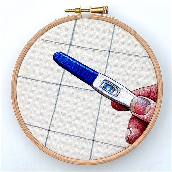 Embroidered hoop of the a sharp scratch by Cath Janes